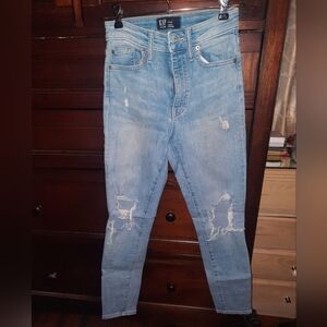Women ripped high rise jeans Gap